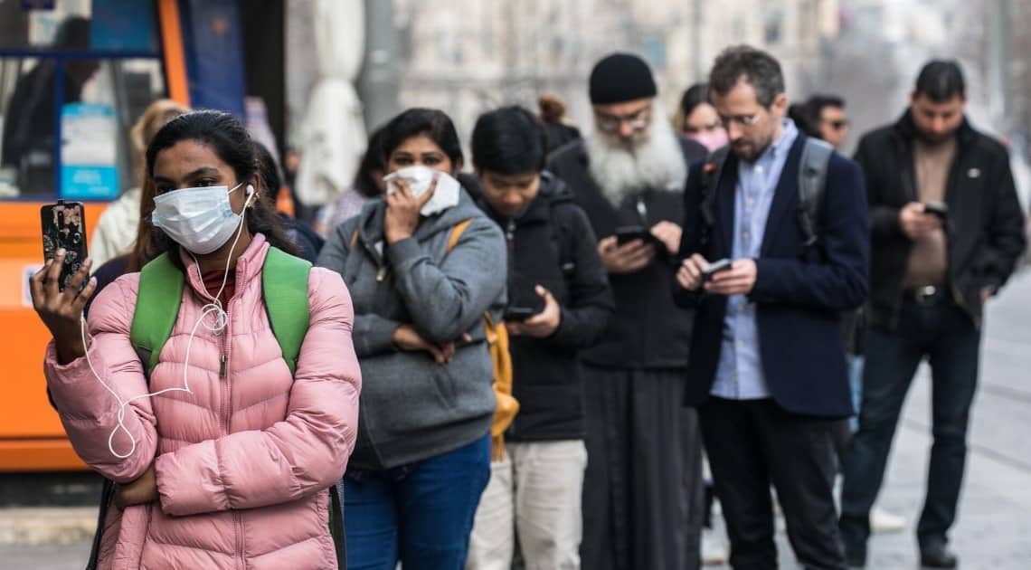 תור לכספומט בירושלים | צילום: אוליבייה פיטוסי, פלאש 90